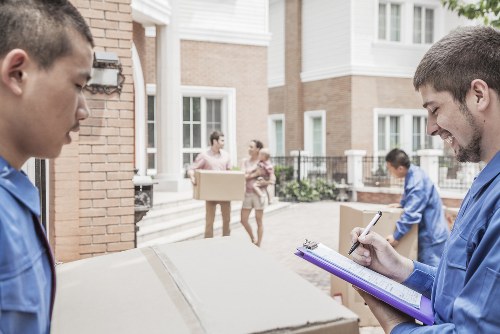 Acton Storage team providing comprehensive moving services